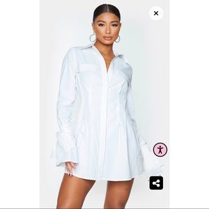 White tie cuff detail pleated shirt dress.